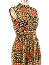 Metal Ring Accented Floral Dress Dress arcadeshops.com