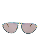 Avus Turquoise and Gold Sunglasses Accessory arcadeshops.com