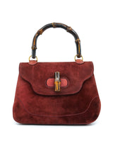1970s Gucci Rust Suede Bamboo Handle Bag Accessory arcadeshops.com