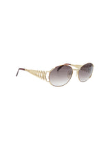 1990s Yves Saint Laurent Tortoise and Goldtone Cutout Sunglasses Accessory arcadeshops.com