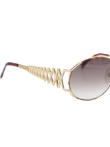 1990s Yves Saint Laurent Tortoise and Goldtone Cutout Sunglasses Accessory arcadeshops.com