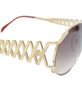 1990s Yves Saint Laurent Tortoise and Goldtone Cutout Sunglasses Accessory arcadeshops.com