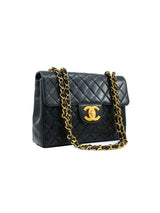 1990s Chanel Quilted Lambskin Jumbo Half Flap Accessory arcadeshops.com
