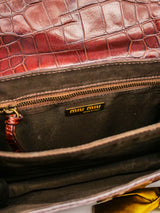 Miu Miu Embossed Leather Top Handle Bag Accessory arcadeshops.com