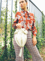 Ivory leather Tassel Bag Accessory arcadeshops.com