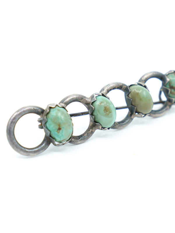 Turquoise Studded Chain Brooch Accessory arcadeshops.com