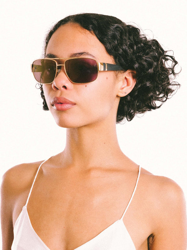 Chopard Black and Goldtone Sunglasses Accessory arcadeshops.com