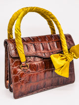 Miu Miu Embossed Leather Top Handle Bag Accessory arcadeshops.com