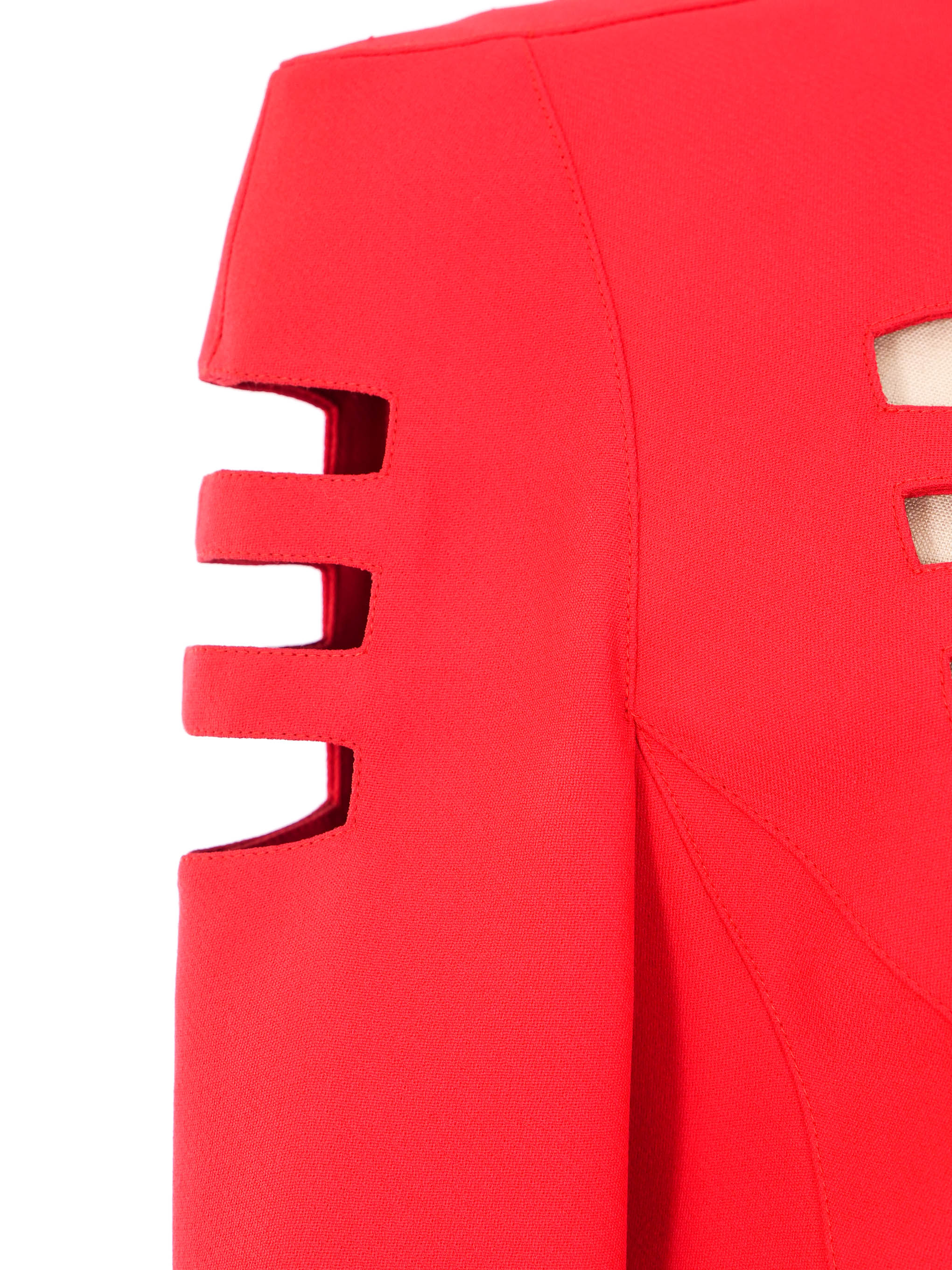 Designed by Manfred Mugler, this fierce red skirt suit set